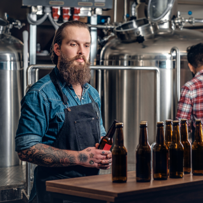 tattooed-bearded-caucasian-indian-men-presenting-craft-beer-microbrewery.jpg image 1