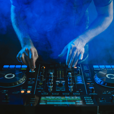 closeup-dj-working-blue-light.jpg image 1