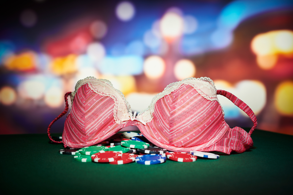 casino chips with a bra on top